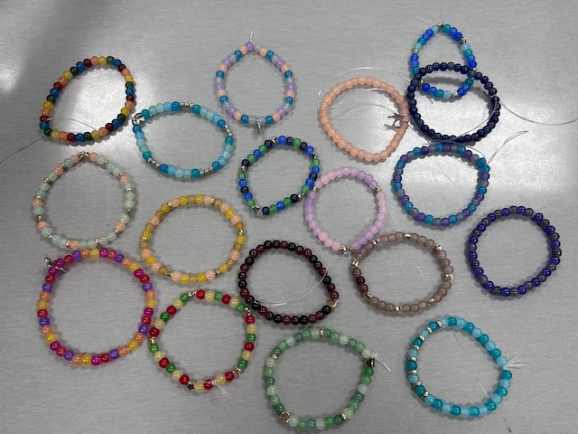 Collection of colorful handmade beaded bracelets